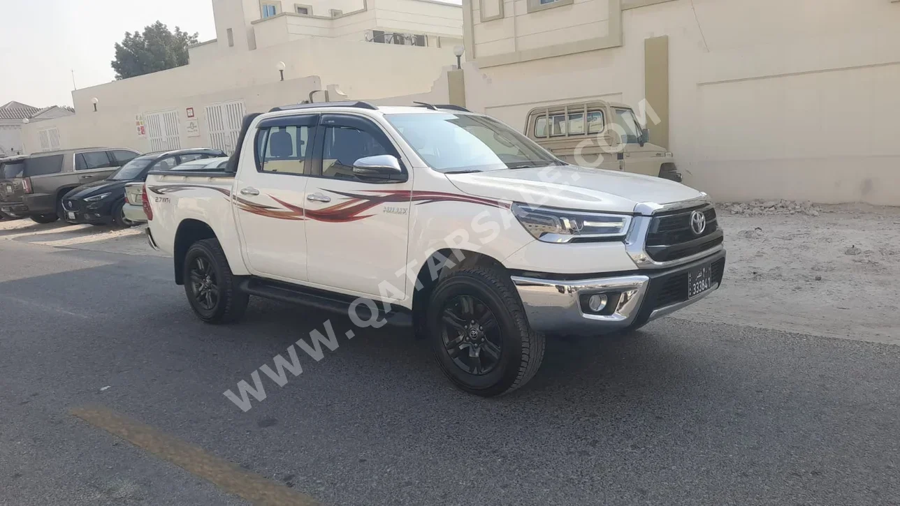 تويوتا  هاي لوكس  2022  اوتوماتيك  96,000 كم  4 سلندر  دفع رباعي  بيكب  أبيض