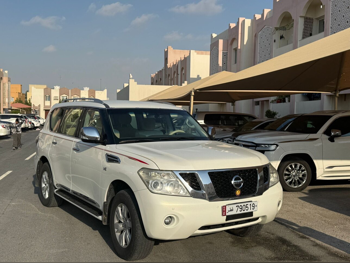 Nissan  Patrol  SE  2013  Automatic  242,000 Km  8 Cylinder  Four Wheel Drive (4WD)  SUV  White