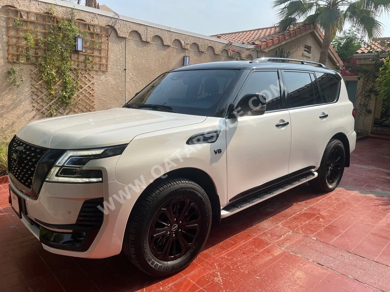 Nissan  Patrol  Titanium  2024  Automatic  15,000 Km  8 Cylinder  Four Wheel Drive (4WD)  SUV  White  With Warranty