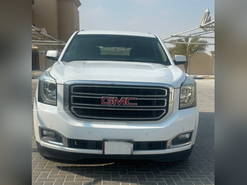 GMC Yukon SLE 2016 Automatic 99,000 Km 8 Cylinder Four Wheel Drive (4WD) SUV White