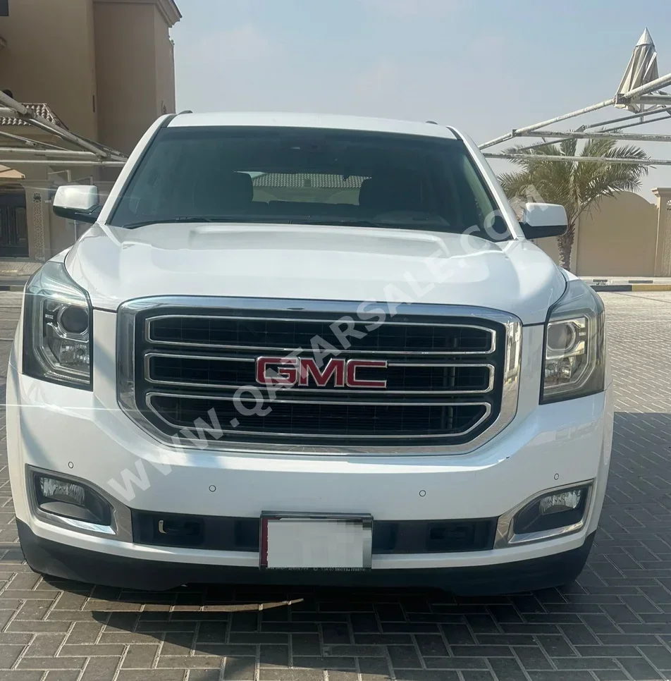 جي ام سي  يوكون  اس ال اي  2016  اوتوماتيك  99,000 كم  8 سلندر  دفع رباعي  اس يو في  أبيض