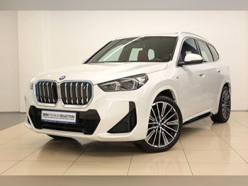 BMW  IX  1  2024  Automatic  10,000 Km  0 Cylinder  Rear Wheel Drive (RWD)  SUV  White  With Warranty