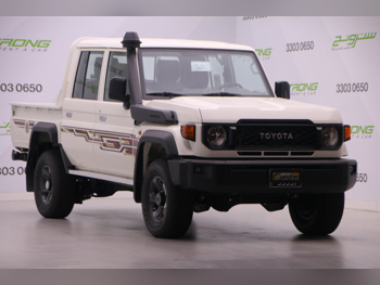 تويوتا  لاند كروزر  ال اكس  2025  عادي  0 كم  4 سلندر  دفع رباعي  بيكب  أبيض  تحت الضمان