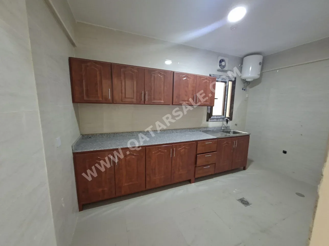 2 Bedrooms  Apartment  For Rent  in Umm Salal -  Umm Salal Ali  Not Furnished