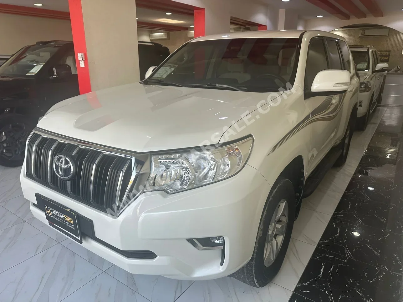 تويوتا  برادو  2018  اوتوماتيك  89,000 كم  4 سلندر  دفع رباعي  اس يو في  أبيض