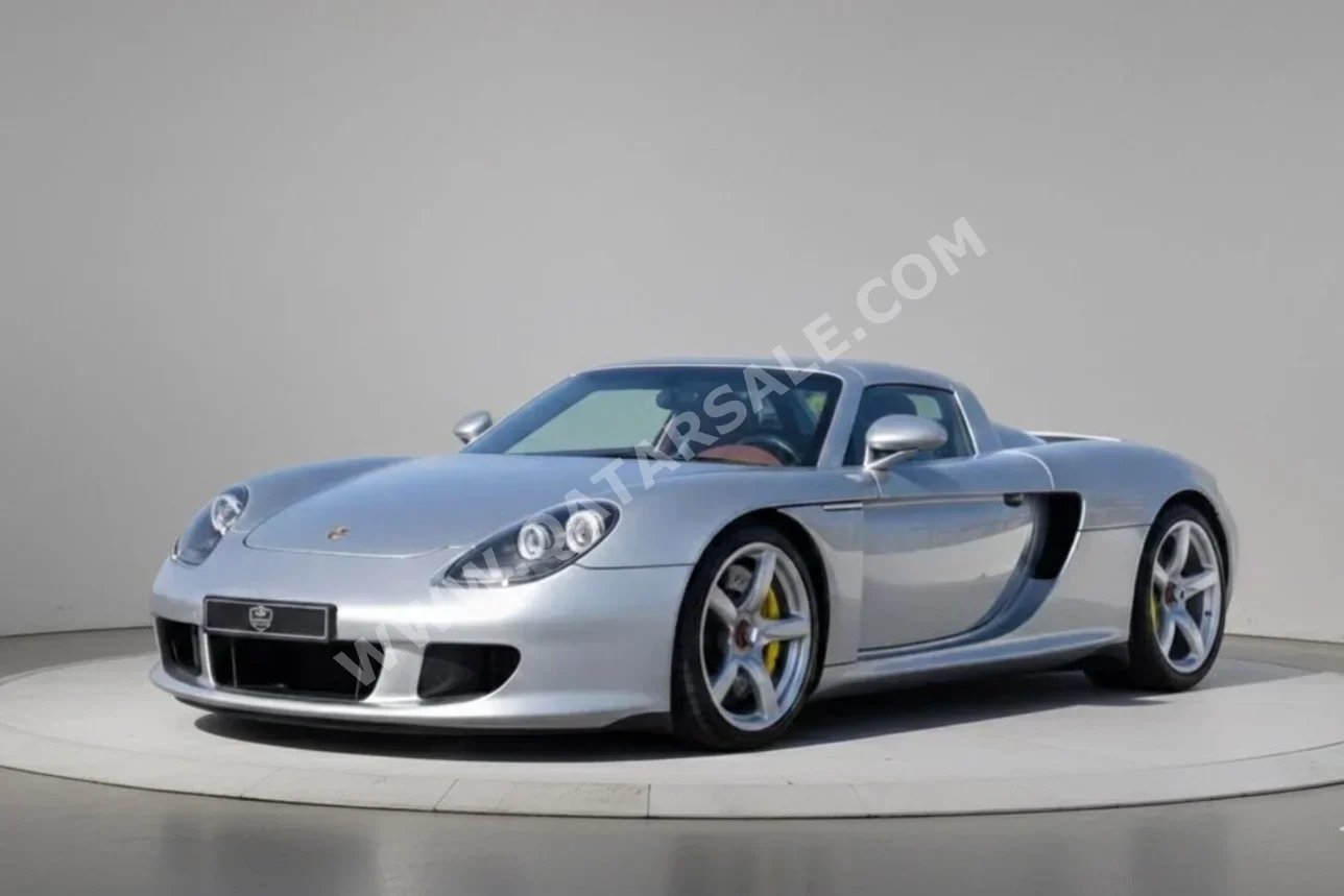 بورش  911  كاريرا جي تي  2006  اوتوماتيك  7,000 كم  10 سلندر  دفع خلفي  كوبيه \ سبورت  فضي