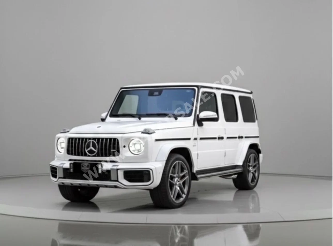 مرسيدس - بنز جي - كلاس 63 اي ام جي 2025 اوتوماتيك 0 كم 8 سلندر دفع رباعي اس يو في أبيض تحت الضمان