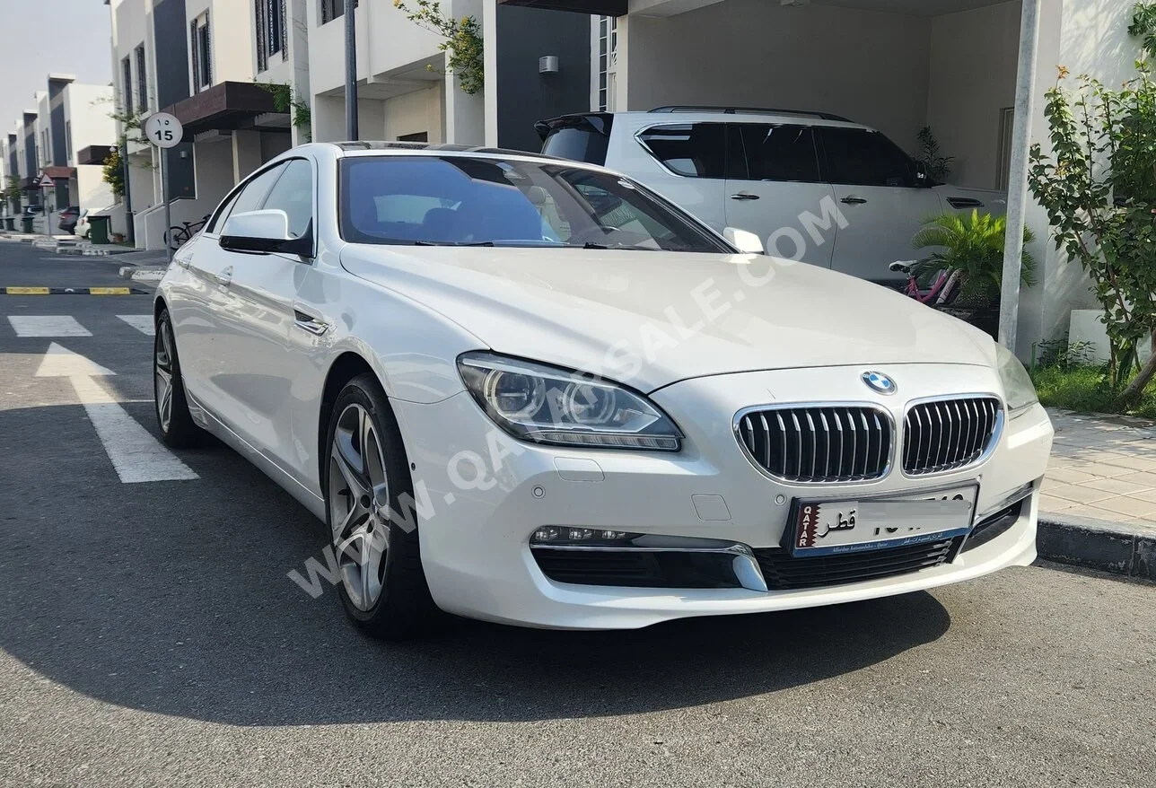BMW  6-Series  640i Gran Coupe  2015  Automatic  69,000 Km  6 Cylinder  Rear Wheel Drive (RWD)  Sedan  White