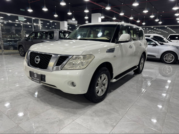 Nissan  Patrol  SE  2013  Automatic  343,000 Km  8 Cylinder  Four Wheel Drive (4WD)  SUV  White