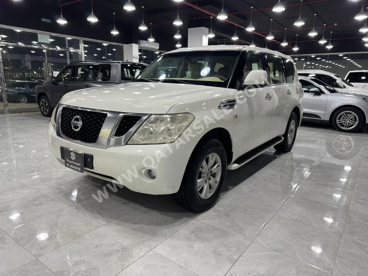 Nissan  Patrol  SE  2013  Automatic  343,000 Km  8 Cylinder  Four Wheel Drive (4WD)  SUV  White