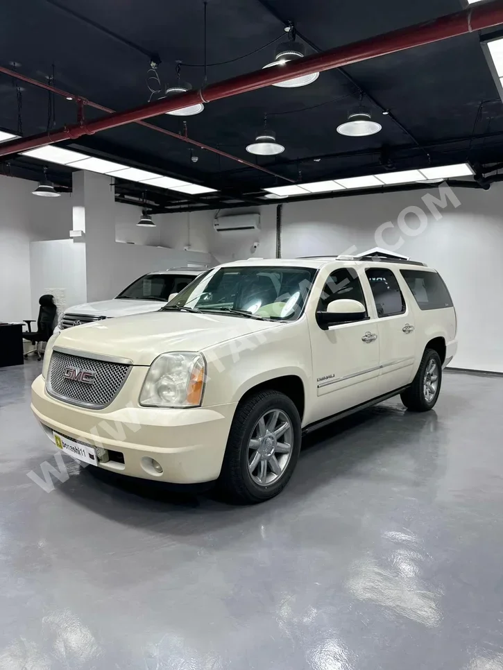 GMC  Yukon  XL  2011  Automatic  66,498 Km  8 Cylinder  Four Wheel Drive (4WD)  SUV  White