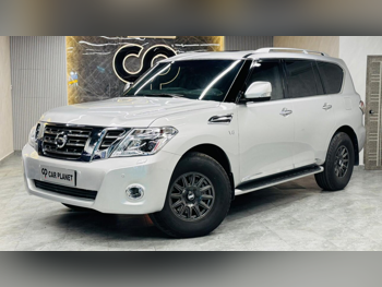 نيسان  باترول  تيتانيوم  2017  اوتوماتيك  185,000 كم  8 سلندر  دفع رباعي  اس يو في  فضي