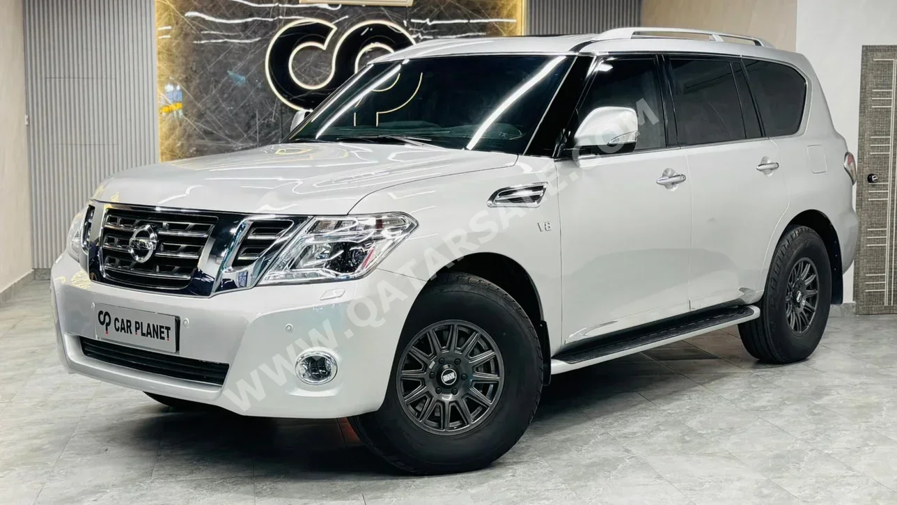 Nissan  Patrol  Titanium  2017  Automatic  185,000 Km  8 Cylinder  Four Wheel Drive (4WD)  SUV  Silver
