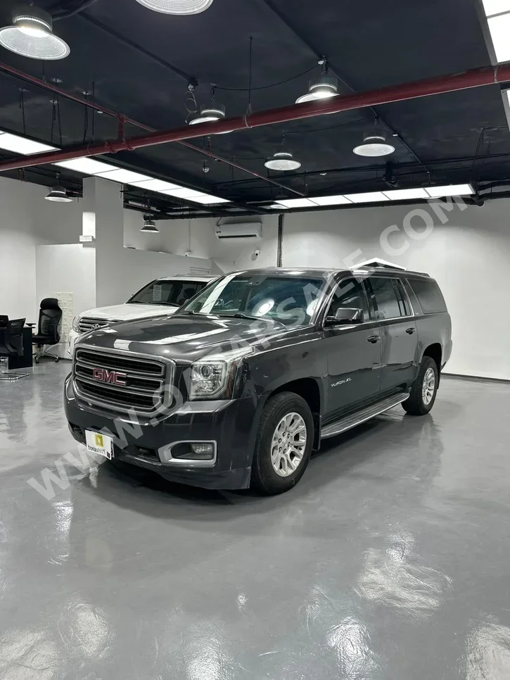 GMC  Yukon  XL  2015  Automatic  258,000 Km  8 Cylinder  Four Wheel Drive (4WD)  SUV  Gray
