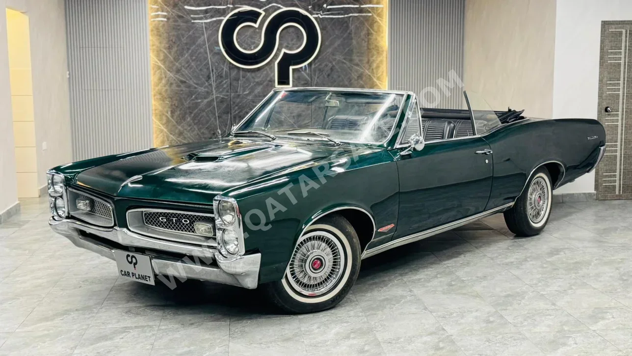 Pontiac  Lemans  1966  Automatic  30,000 Km  8 Cylinder  Rear Wheel Drive (RWD)  Classic  Dark Green