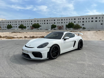 بورش كايمان جي تي 4 2020 عادي 58,000 كم 6 سلندر دفع خلفي كوبيه \ سبورت أبيض