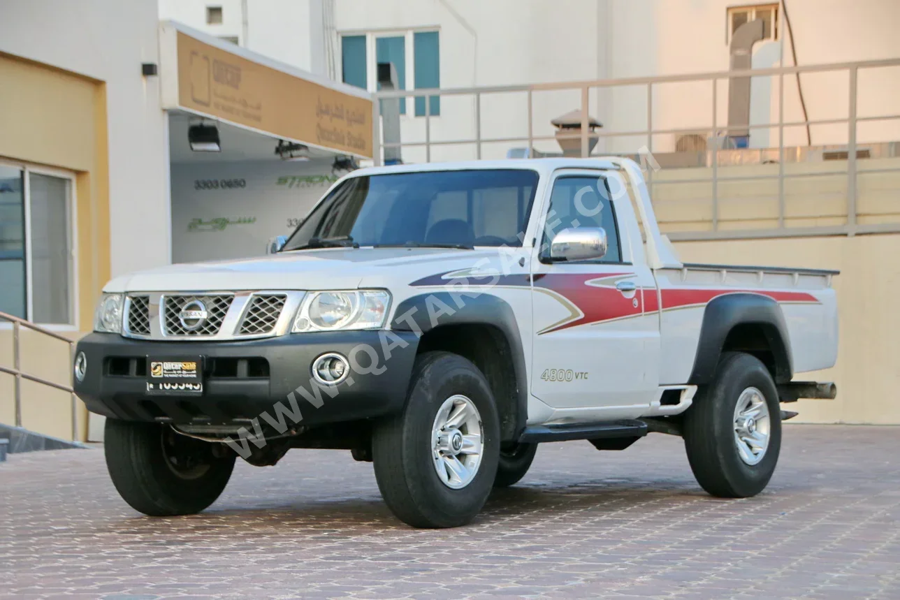 Nissan  Patrol  Pickup  2012  Manual  325,000 Km  6 Cylinder  Four Wheel Drive (4WD)  Pick Up  White