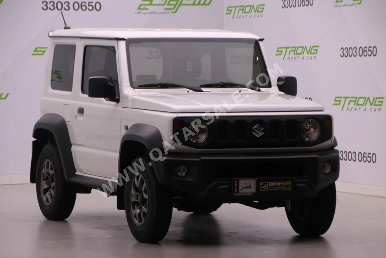 Suzuki  Jimny  2023  Manual  8,911 Km  4 Cylinder  Four Wheel Drive (4WD)  SUV  White  With Warranty