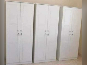 خزائن ودواليب الملابس والزينة - دوحة فيرنيتشر - خزائن - أبيض