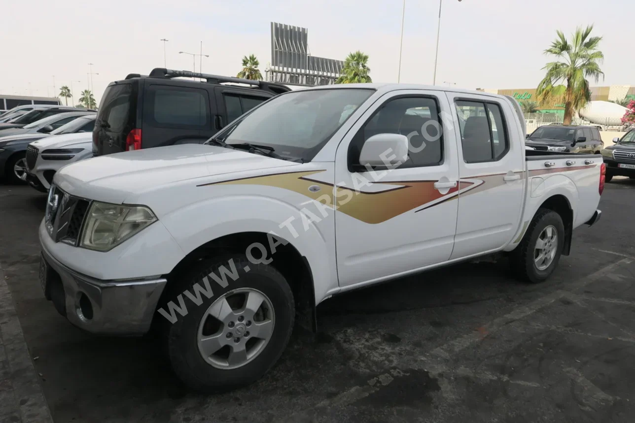 نيسان نافارا 2014 اوتوماتيك 212,000 كم 4 سلندر دفع خلفي بيكب أبيض