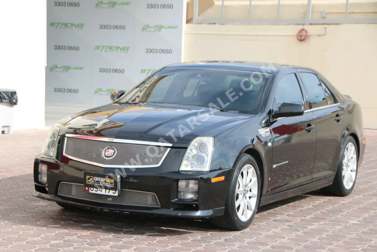 كاديلاك اس تي اس في سوبرتشارج 2009 اوتوماتيك 120,000 كم 8 سلندر دفع خلفي سيدان أسود