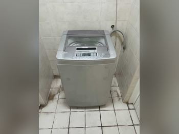مجموعات الغسالات والمجففات ال جي \  8 كغ  حسب الطلب  غسالة تحميل علوي  كهرباء