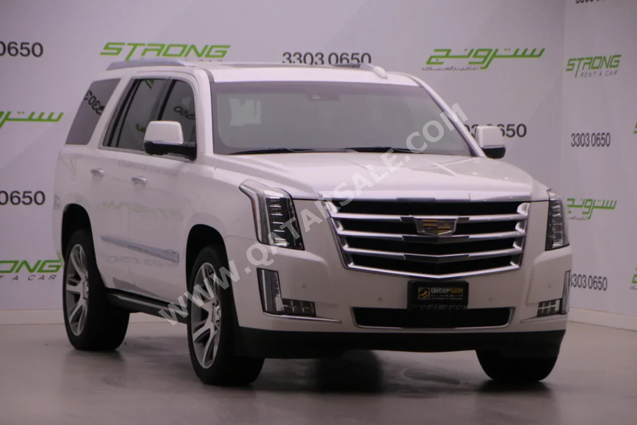 كاديلاك اسكيليد 2016 اوتوماتيك 110,000 كم 8 سلندر دفع رباعي اس يو في أبيض