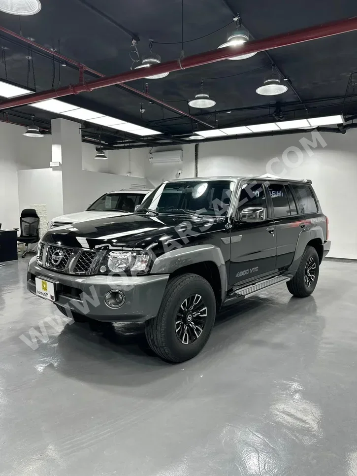 نيسان باترول سوبر سفاري 2024 اوتوماتيك 36,268 كم 6 سلندر دفع رباعي اس يو في أسود