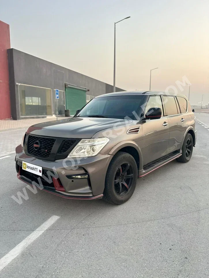 نيسان باترول أكس أي 2014 عادي 165,000 كم 8 سلندر دفع رباعي اس يو في بني غامق