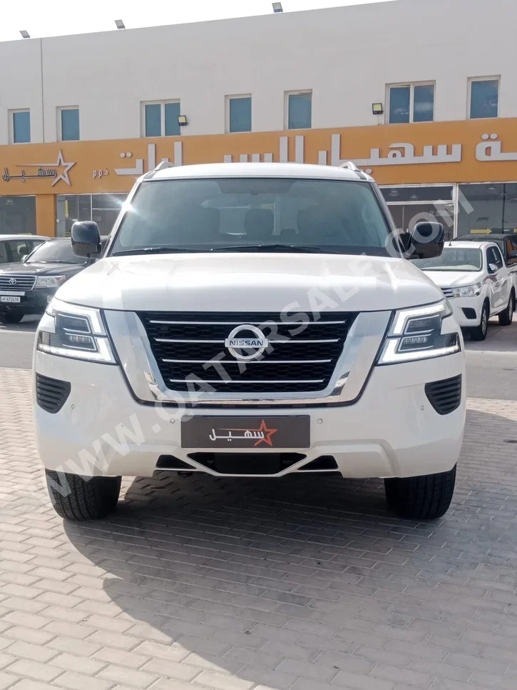 نيسان باترول اس اي 2021 اوتوماتيك 119,000 كم 8 سلندر دفع رباعي اس يو في أبيض