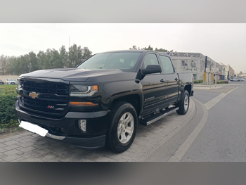Chevrolet  Silverado  LT  2018  Automatic  131,000 Km  8 Cylinder  Four Wheel Drive (4WD)  Pick Up  Black