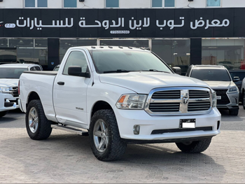 دودج رام 2016 اوتوماتيك 200,000 كم 8 سلندر دفع رباعي بيكب أبيض