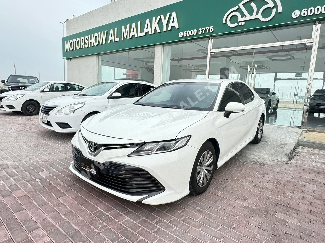 تويوتا كامري أل اي 2018 اوتوماتيك 260,000 كم 4 سلندر سحب امامي سيدان أبيض