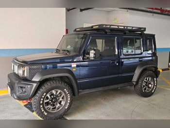 Suzuki  Jimny  GLX  2024  Automatic  27,200 Km  4 Cylinder  Four Wheel Drive (4WD)  SUV  Black and Blue  With Warranty