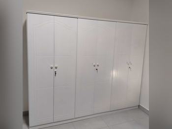 خزائن ودواليب الملابس والزينة - دوحة فيرنيتشر - خزائن - أبيض