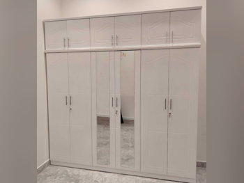 خزائن ودواليب الملابس والزينة - دوحة فيرنيتشر - خزائن - أبيض