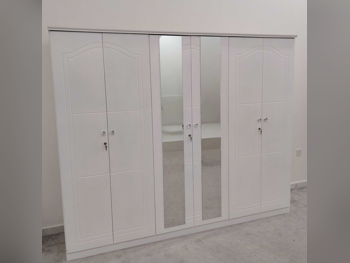 خزائن ودواليب الملابس والزينة - دوحة فيرنيتشر - خزائن - أبيض