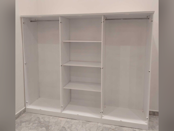 خزائن ودواليب الملابس والزينة - دوحة فيرنيتشر - خزائن - أبيض