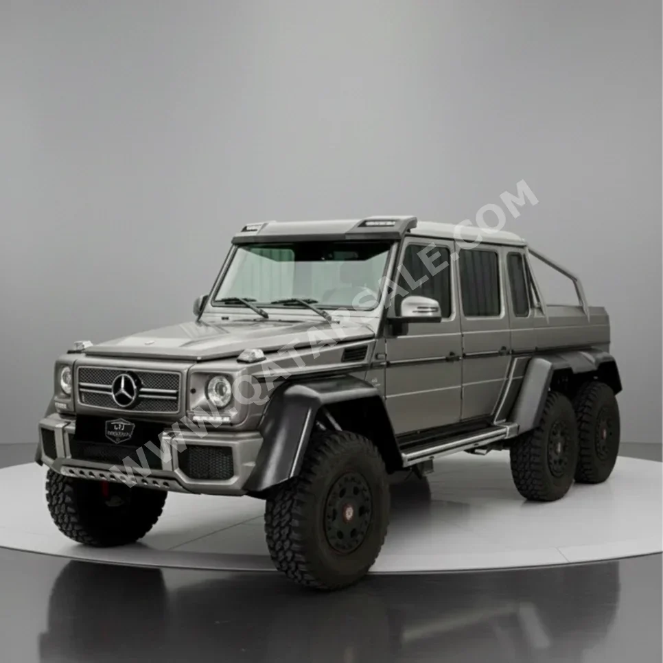 مرسيدس - بنز جي - كلاس 63 اي ام جي 4x4² 2015 اوتوماتيك 2,000 كم 8 سلندر دفع كلي مستمر اس يو في رمادي تحت الضمان