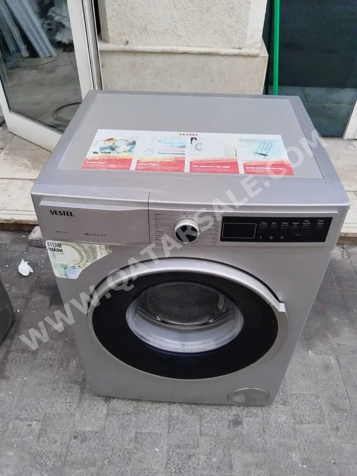 غسالة ملابس & الكل في واحد فيستيل \  غسالة تحميل أمامي  اللون الرمادي