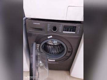غسالة ملابس & الكل في واحد سامسونج \ غسالة تحميل أمامي اللون الرمادي