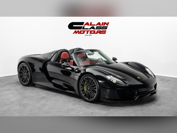 Porsche  918  Spyder  2015  Automatic  865 Km  8 Cylinder  All Wheel Drive (AWD)  Convertible  Black