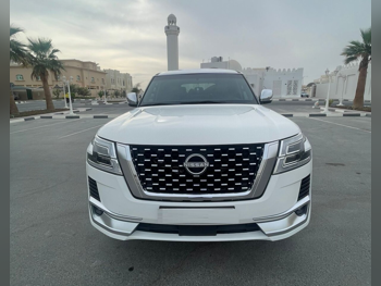 Nissan  Patrol  Platinum  2015  Automatic  300,000 Km  8 Cylinder  Four Wheel Drive (4WD)  SUV  White