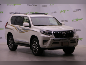 تويوتا  برادو  تي اكس ال  2022  اوتوماتيك  123,000 كم  6 سلندر  دفع رباعي  اس يو في  أبيض