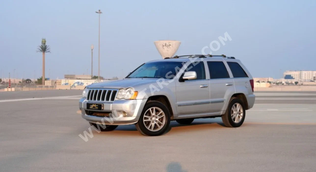 جييب جراند شيروكي اوفرلاند 2009 اوتوماتيك 163,000 كم 8 سلندر دفع رباعي اس يو في فضي