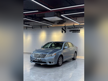 تويوتا  أفالون  لمتيد  2011  اوتوماتيك  331,000 كم  6 سلندر  سحب امامي  سيدان  رمادي