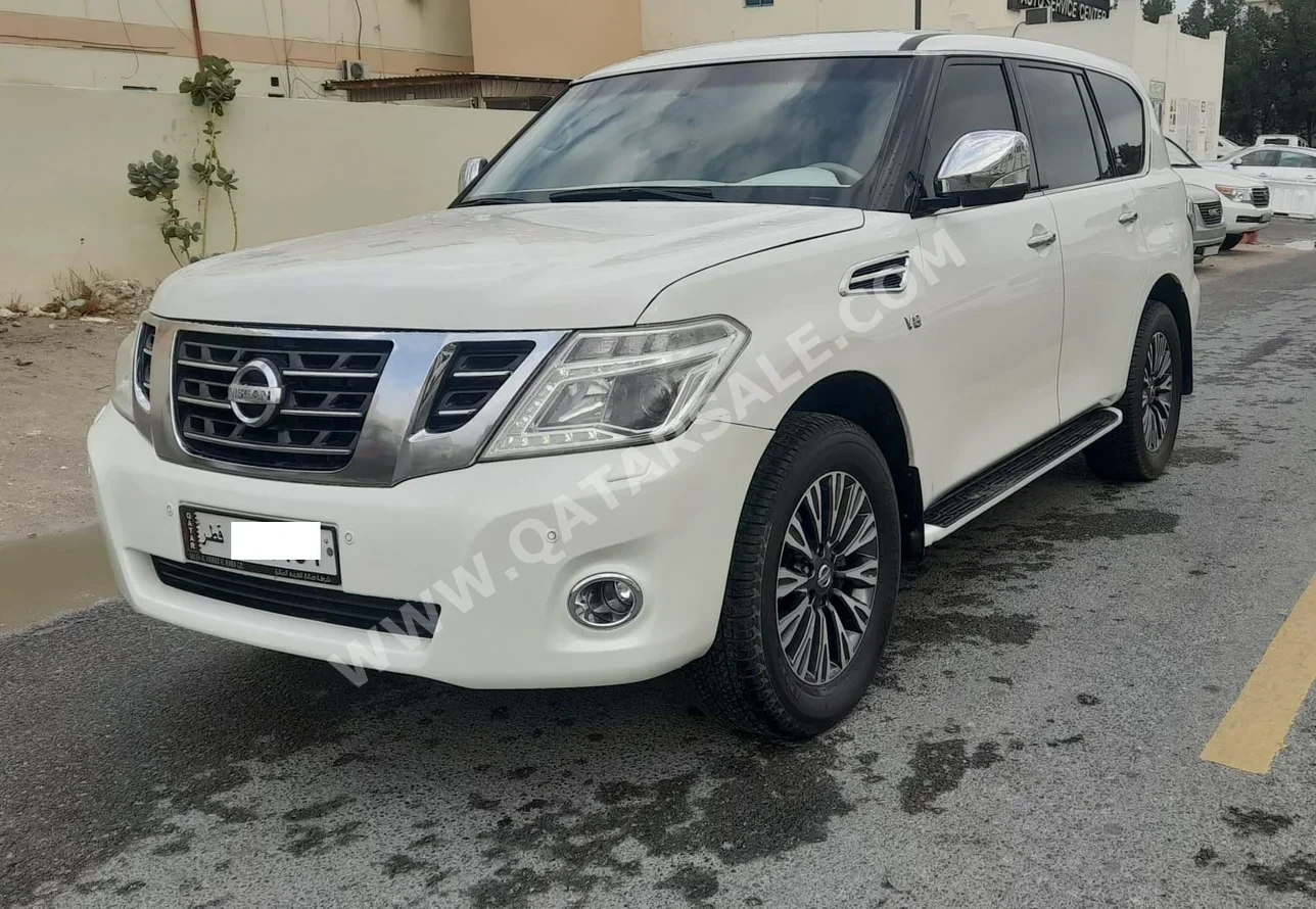 Nissan Patrol Titanium 2015 Automatic 324,000 Km 6 Cylinder Four Wheel Drive (4WD) SUV White
