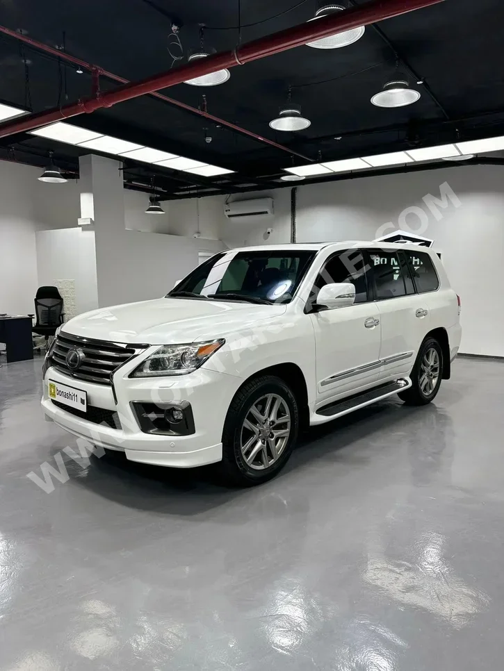 لكزس ال اكس 570 اس 2014 اوتوماتيك 128,000 كم 8 سلندر دفع رباعي اس يو في أبيض لؤلؤي