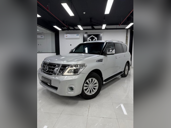 Nissan  Patrol  SE  2015  Automatic  230,000 Km  8 Cylinder  Four Wheel Drive (4WD)  SUV  Silver