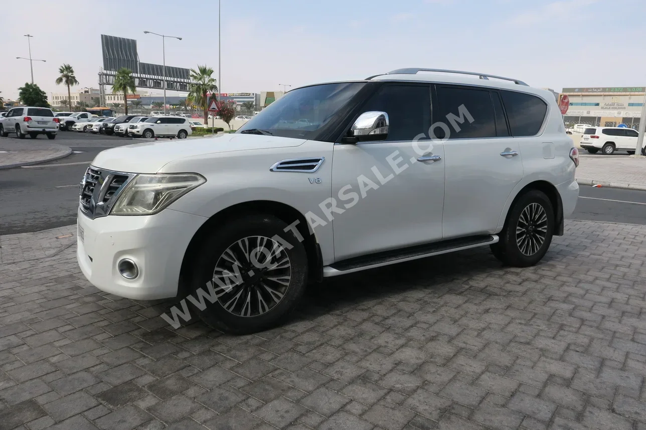 نيسان  باترول  اس اي  2013  اوتوماتيك  366,000 كم  8 سلندر  دفع رباعي  اس يو في  أبيض